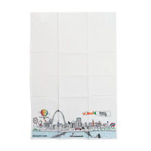 Load image into Gallery viewer, An unfolded white tea towel features a wide embroidered panorama along its bottom edge depicting iconic St. Louis landmarks, including the Gateway Arch, Busch Stadium, a hot air balloon, an airplane pulling a "Spirit of St. Louis" banner, and the Mississippi River.
