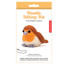 Load image into Gallery viewer,  a finished "Needle Felting Kit" project.  on the packaging there is  a small, plump, hand-crafted wool bird with a white belly, an orange chest, a brown back and head, small black plastic eyes, and tiny grey felted feet.
