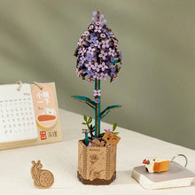 Load image into Gallery viewer, Lilac wooden model including snails and flower pot
