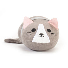Load image into Gallery viewer, the unpackaged plush cat screen cleaner resting forward-facing on a solid white surface. It features a soft grey body, a white triangular patch on its face with simple embroidered eyes and whiskers, pointy pink felt ears, and a thin grey elastic strap wrapped around its middle.

