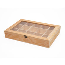 Load image into Gallery viewer, An angled side view of a closed, light-colored wooden box with a glass lid displaying fifteen internal grid compartments and a metal front latch.
