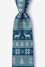 Load image into Gallery viewer, Teal blue tie featuring a white Fair Isle holiday pattern with reindeer, snowflakes, and trees.
