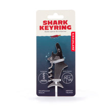 Load image into Gallery viewer, Kikkerland Shark Keyring featuring a bottle opener and corkscrew attached to retail card packaging.
