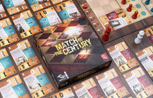 Load image into Gallery viewer, image of the front of game box with cards around

