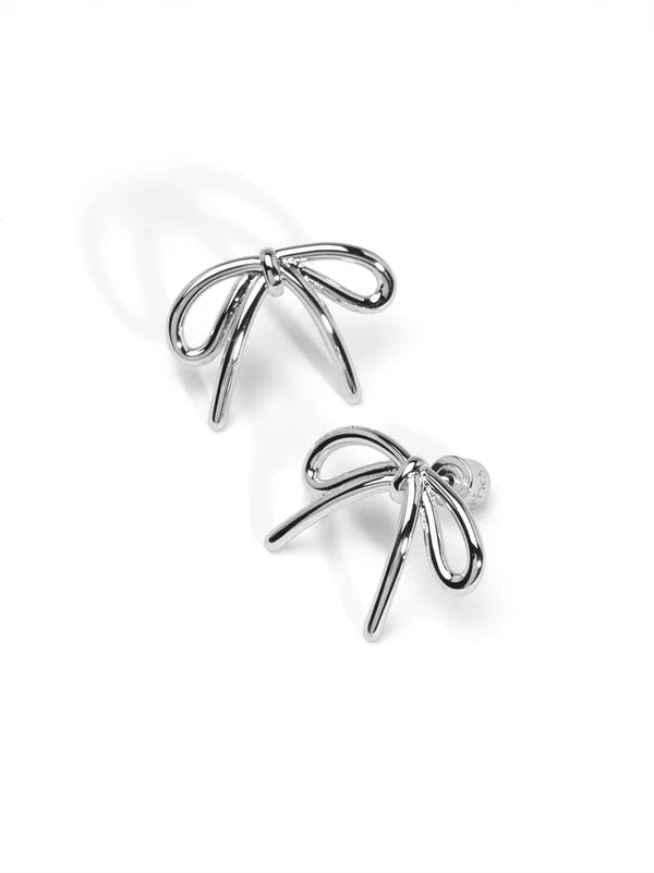 image of small silver bow studs

