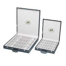 Load image into Gallery viewer, Two open gray leatherette chess piece storage cases of different sizes resting side by side to display their felt-lined compartments.
