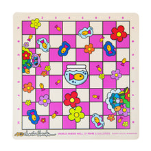 Load image into Gallery viewer, A square, colorful vinyl chessboard featuring pop-art illustrations of fish, flowers, cats, and a central fishbowl set against a pink and cream grid with peripheral alphanumeric notation and border branding.
