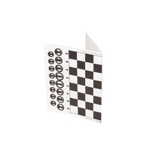 Load image into Gallery viewer, A paper card printed with a black-and-white chessboard grid and circular game piece tokens, standing slightly folded on its edge.
