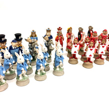 Load image into Gallery viewer, Alice in Wonderland Painted Resin Chess Set on Cherry Chest
