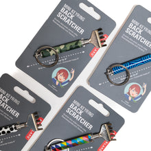 Load image into Gallery viewer, Close-up of packaged mini keyring back scratchers in various patterned handles.
