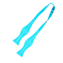 Load image into Gallery viewer, This is an untied bright cyan-blue bow tie featuring a contrasting white print modeled after a detailed chess game score sheet.
