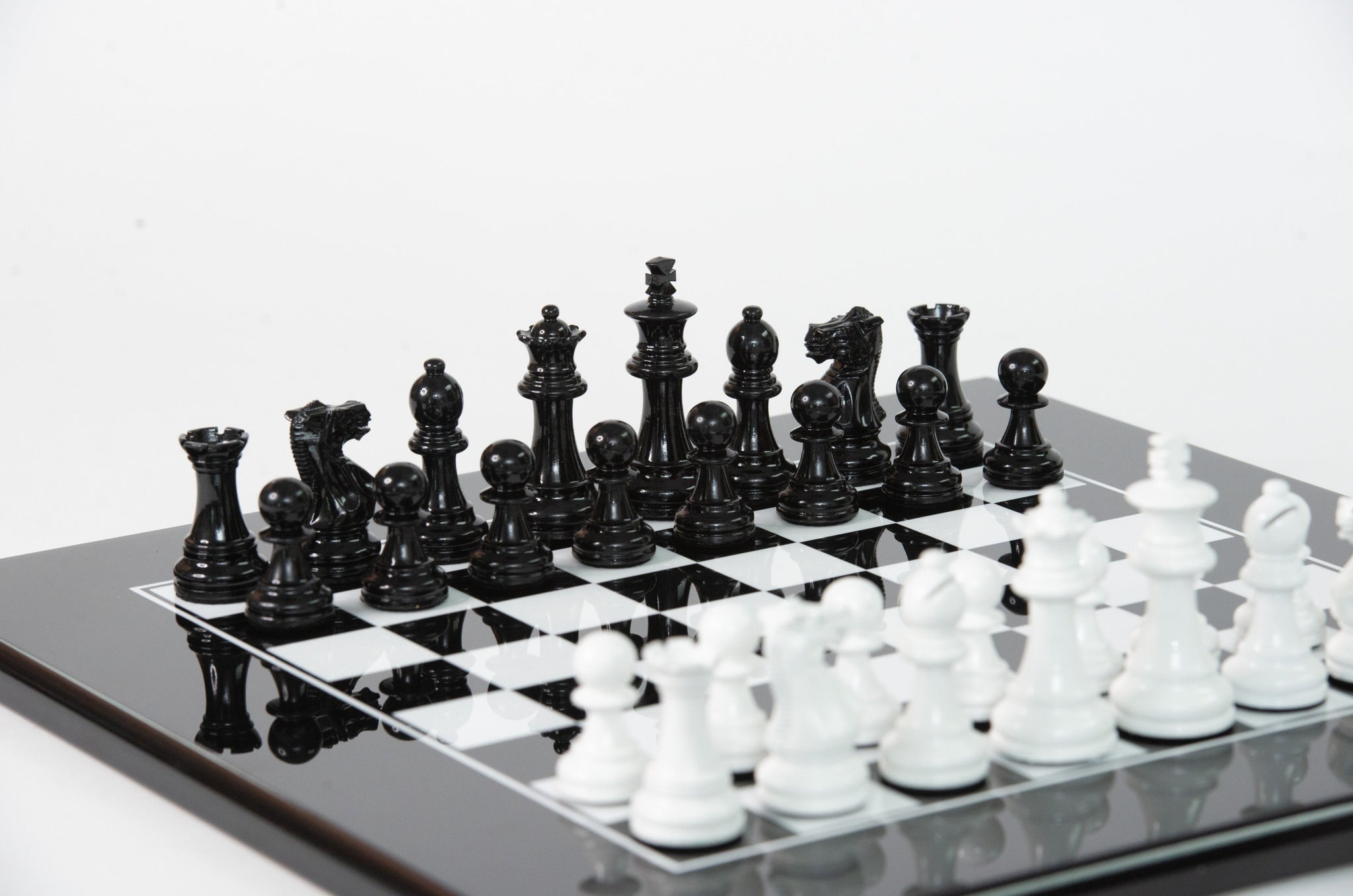 Handmade chess board in black and white lacquered wood