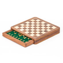Load image into Gallery viewer, A wooden chess set with a pull-out side drawer featuring green felt inserts designed to store individual chess pieces beneath the playing board.
