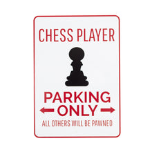 Load image into Gallery viewer,  A white metal novelty sign designed to look like a official parking sign. It features red text reading "CHESS PLAYER" at the top, a black silhouette of a chess pawn piece in the center, bold red text stating "PARKING ONLY", and smaller red text at the bottom that reads "ALL OTHERS WILL BE PAWNED."
